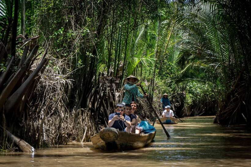 Essential Mekong Delta: Highlight Tour from Ho Chi Minh City - The Tien River Cruise: Four Islets, Fish Rafts, and a Bridge Pass