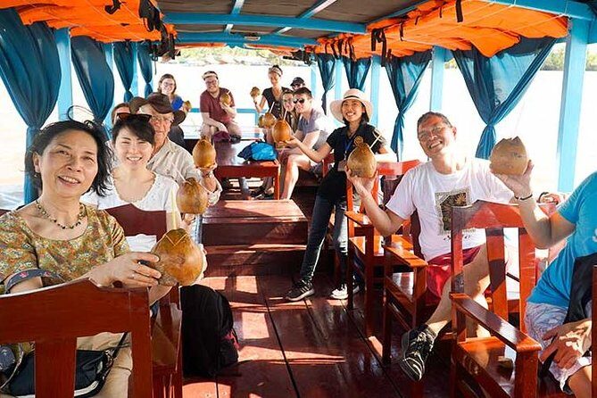 From HCM City: Mekong Delta Tour with Sampan Journey - What to watch for: tip requests, shopping stops, and pickup limitations