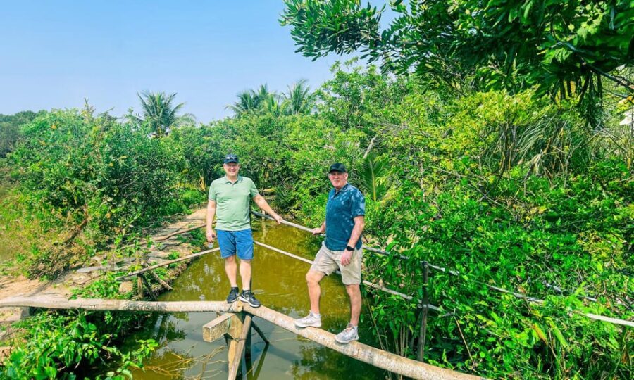 From HCM: Cost-Saving CuChi Tunnel & Mekong Delta 1-Day Tour - Bee Farm, Floating Fish Farm, and Coconut Candy Moments