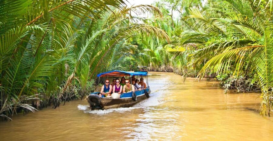 From Ho Chi Minh: Cu Chi Tunnels & Mekong Delta Full Day - Coconut candy, honey tea, fruit gardens, and folk music