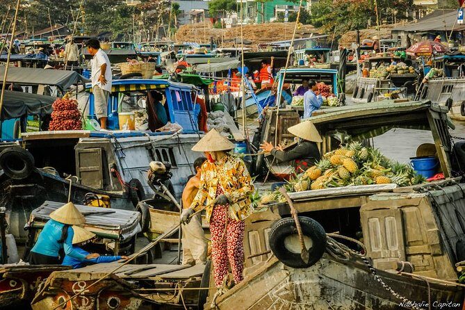 Incredible Mekong Delta Tour 3-day from Ho Chi Minh City - Day 1: My Tho riverside calm and Vinh Trang’s temple-meets-meal stop