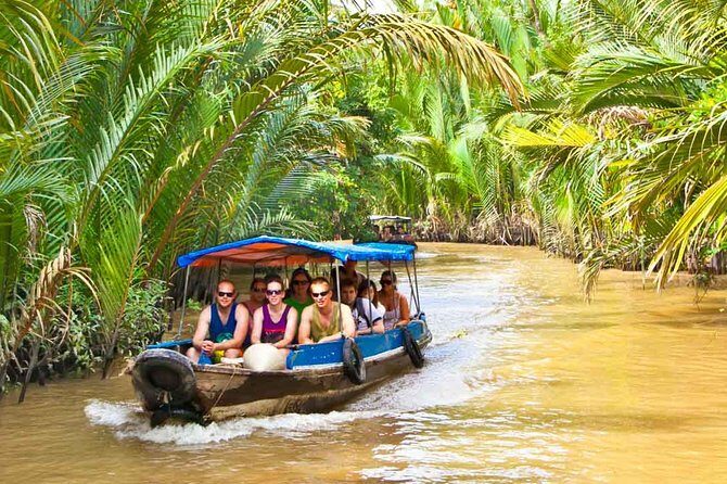 My Tho Ben Tre Mekong River full day trip - Hand-Rowed Sampan Under Coconut Trees: The Best Pace Change